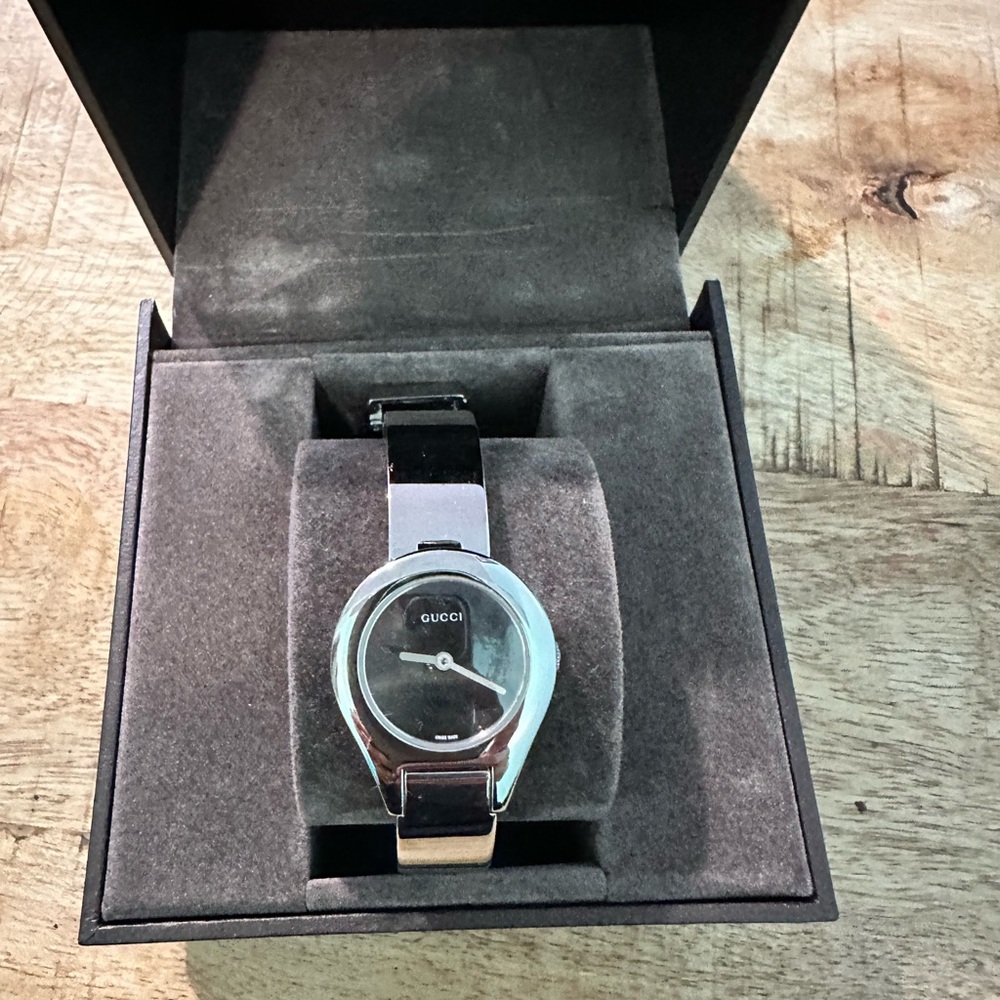 Gucci silver buckle watch